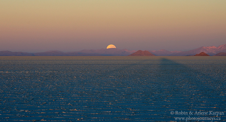 Full moon setting on Uyuni salt lake