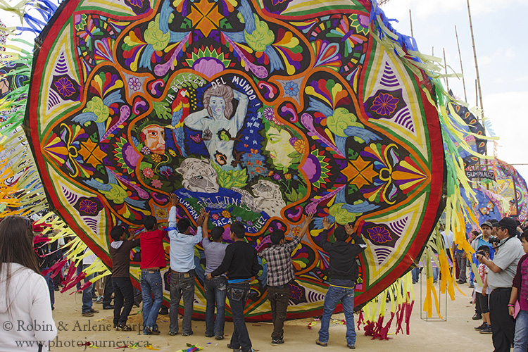 Hoisting up a giant kite, Sumpongo, Guatemala.